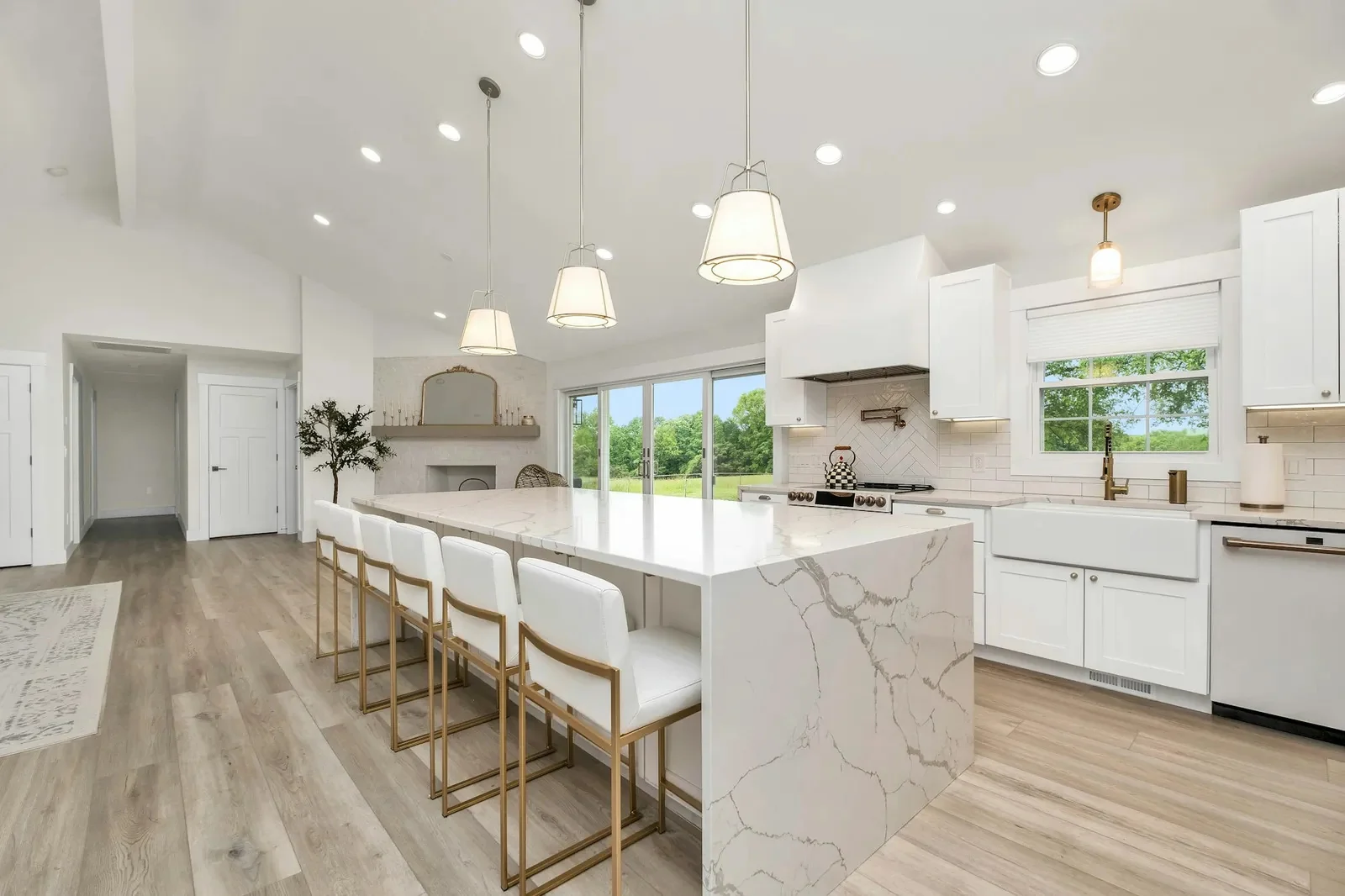 Modern white kitchen with island and pendant lighting