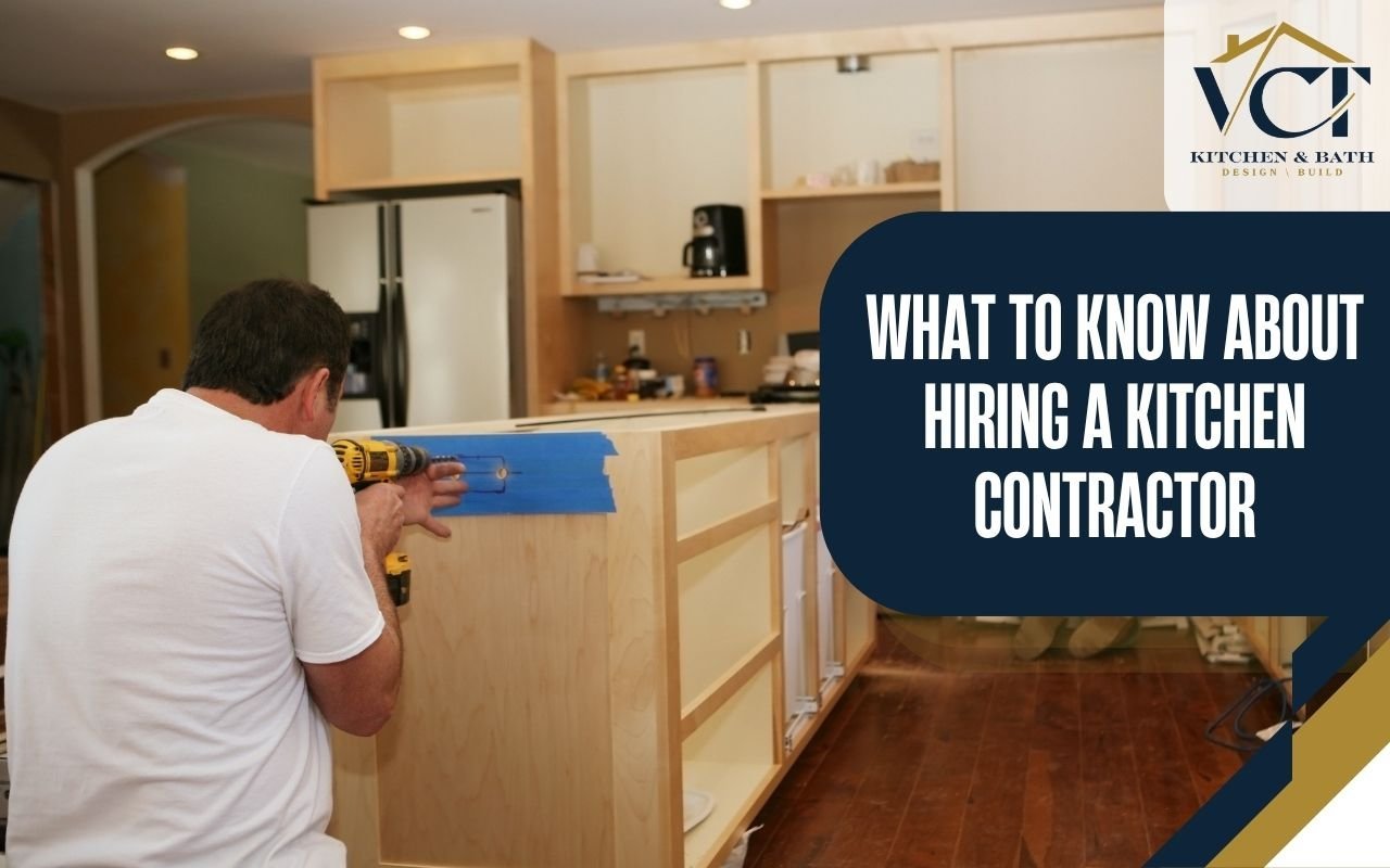 Contractor installing cabinetry during a kitchen remodel