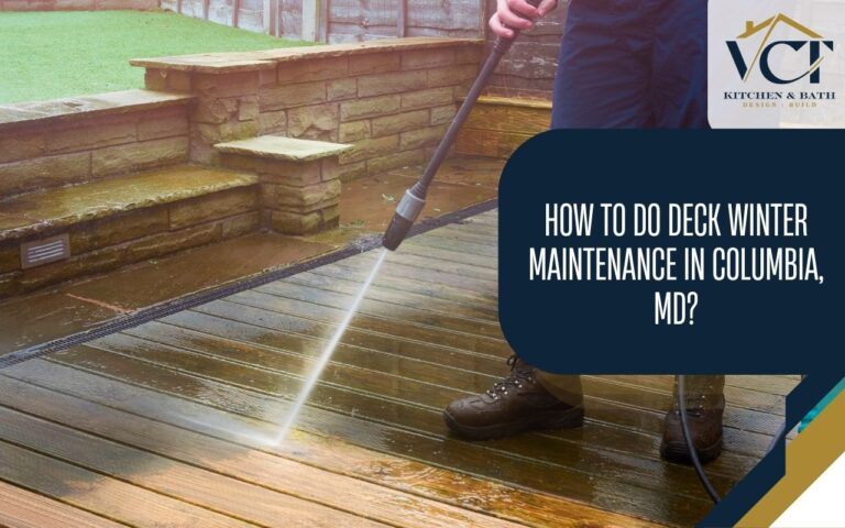Homeowner doing Deck Winter Maintenance in Columbia, MD by cleaning boards before sealing.
